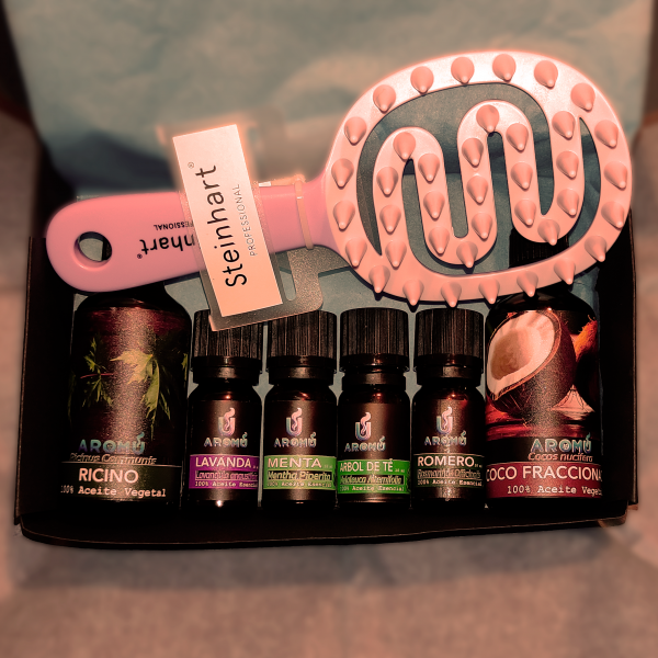 "Promoción Hair Luxe Experience: Set de lujo para el cuidado del cabello que incluye un masajeador Steinhart, aceites esenciales naturales (ricino, coco, lavanda, menta, romero, árbol de té) y una guía práctica, presentado con un diseño elegante y exclusivo Black Friday por 38 €.